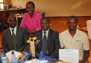 Mr Basil Ajer (left) poses for a picture with the Winning Team Representatives